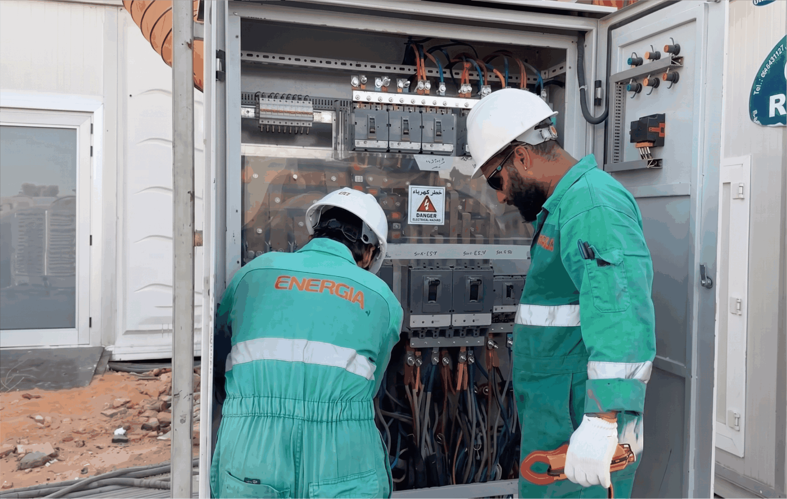 Energia technicians at a main distribution board